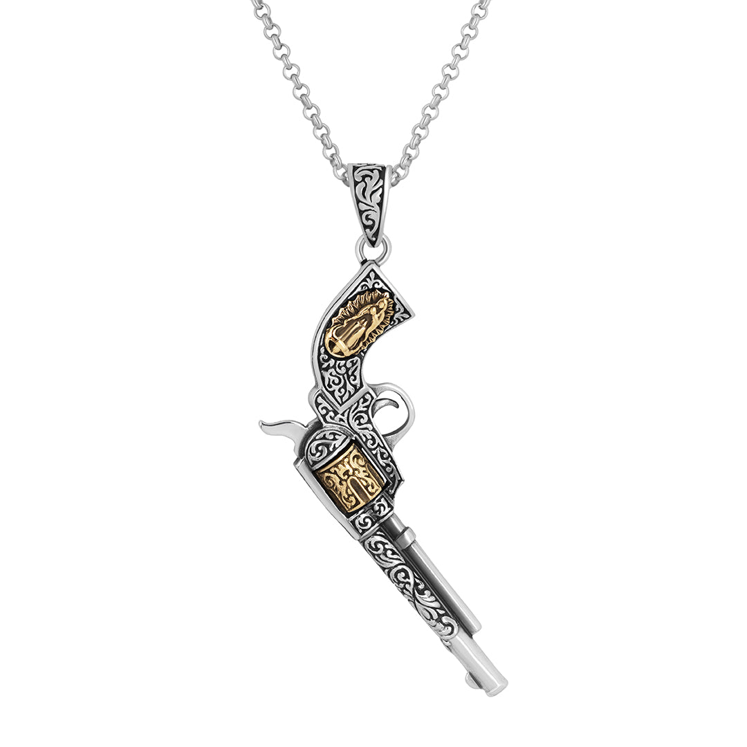 Two ornate skull pendants with intricate gold and silver detailing on chains.